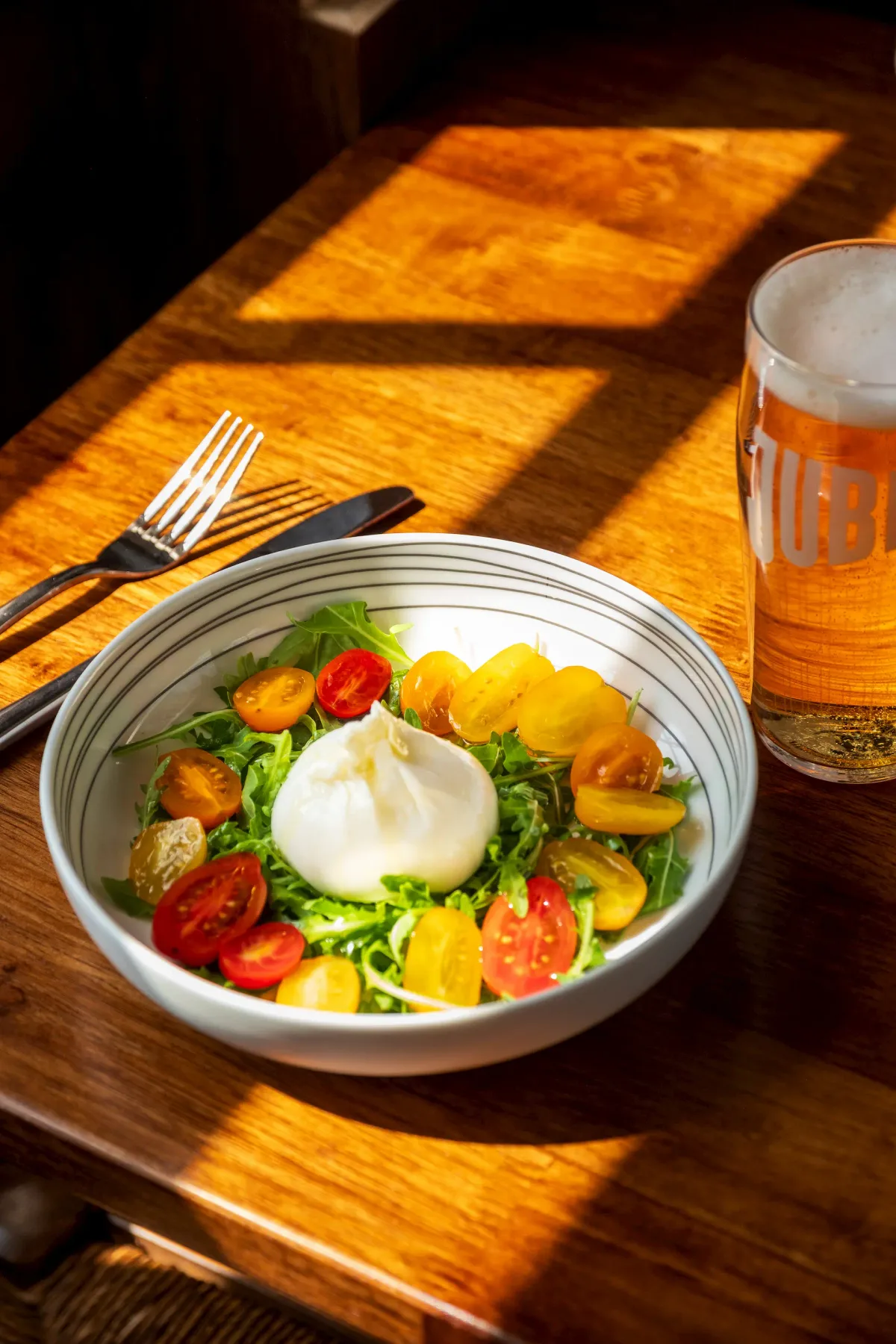 Fresh salad and a pint